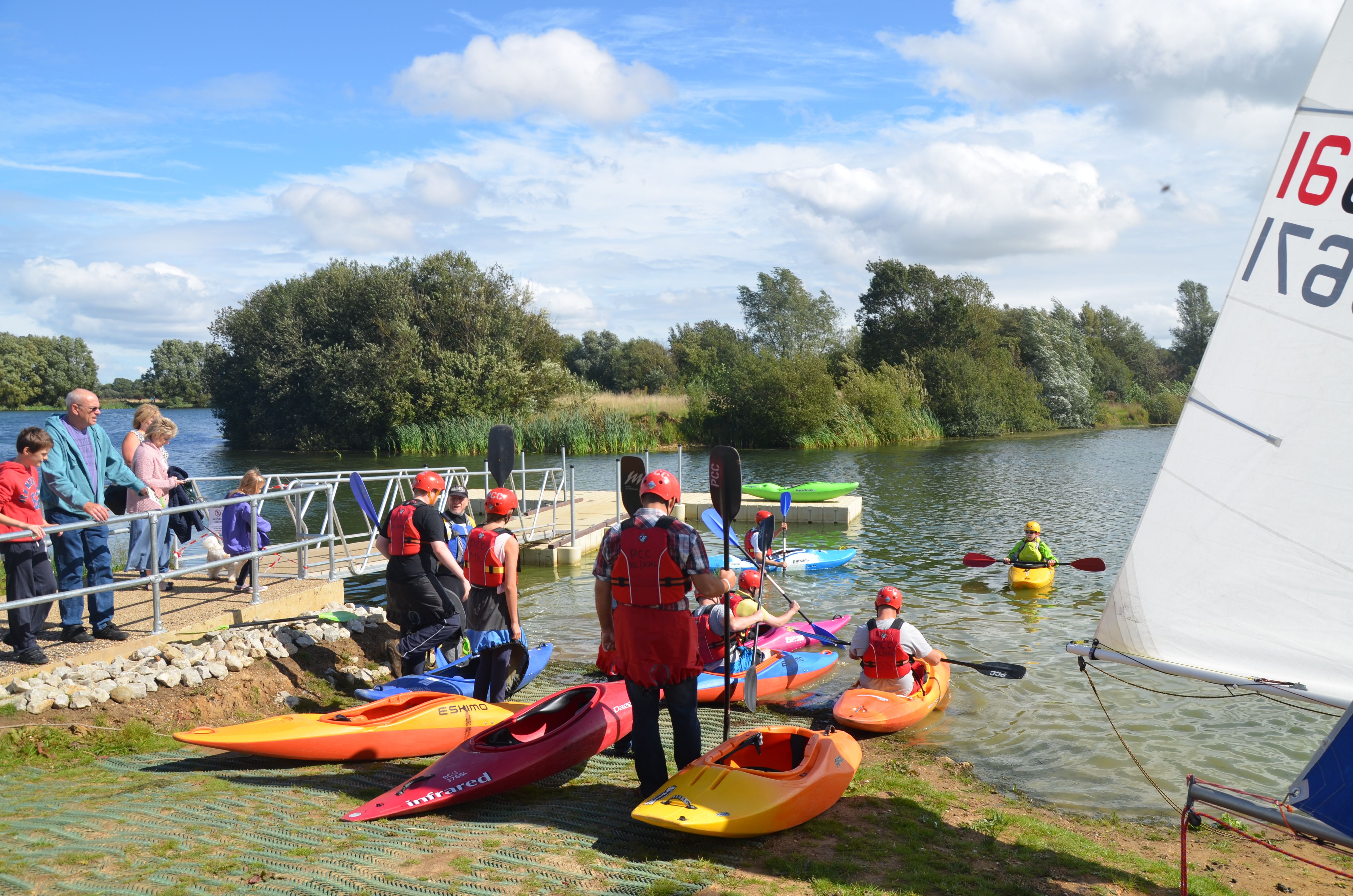 Conningbrook Lake people and canoes.jpg